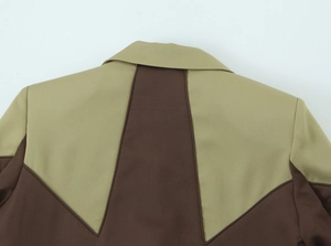 Detail of the brown and khaki star-shaped patchwork on the back collar and shoulder area