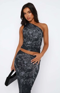 Detail of grey marble tie-dye one-shoulder top and ruched skirt set on model