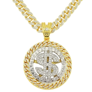 Collier rotatif avec signe dollar et cristaux sur une chaîne cubaine dorée