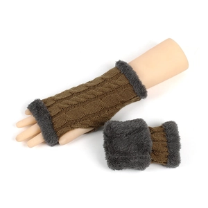 Detail of cable knit fingerless gloves with brown yarn and dark grey faux fur trim edges