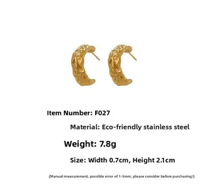 Detailed specs of gold C-shaped earrings with molten texture and stainless steel material