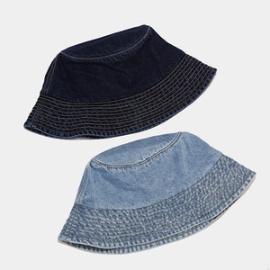 Retro washed denim bucket hat in dark and light blue colors for outdoor sun protection