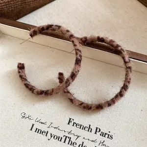Vintage leopard print plush hoop earrings with golden needles for autumn and winter outfits