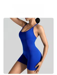 Close-up of royal blue seamless sports romper with thin straps and U-neck design