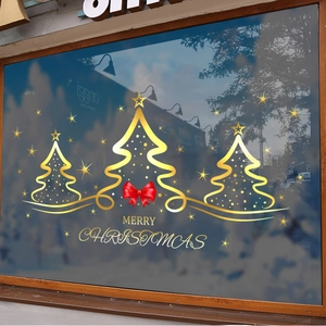 Golden Christmas tree window stickers with red bow and Merry Christmas text for shop decor