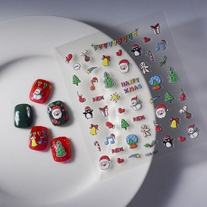 3D Christmas embossed nail stickers featuring colorful Santa, snowmen, and reindeer designs