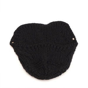 Fashionable black knit peaked cap with warm texture and gold metal rivets on white background