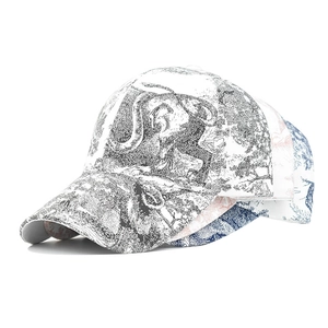 Tie-dye baseball cap with sketch nature prints on a classic curved brim six-panel hat