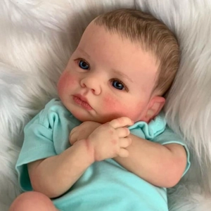 Realistic 49cm newborn reborn doll Loulou awake with blue eyes and blue baby bodysuit