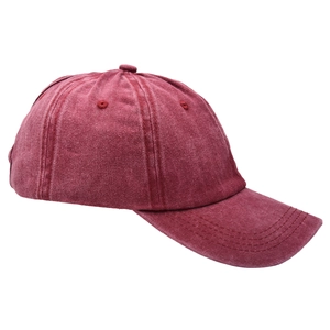 Close-up of burgundy washed cotton baseball cap featuring high-quality fabric texture