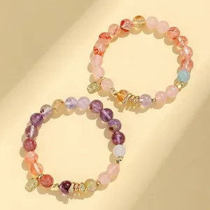 Beaded amethyst and rose quartz bracelet with gold snake pendant for Year of the Snake