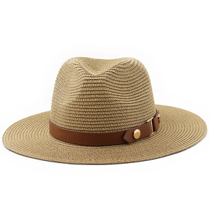 Detail of light brown straw fedora featuring a leather band and golden metal buckle