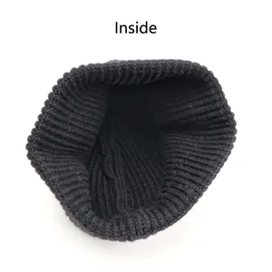 Black ribbed knit beanie with thermal thickened lining detail for winter outdoor warmth