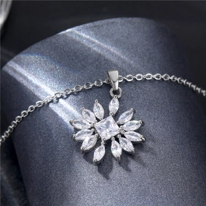 Elegant silver sunflower pendant necklace with marquise-cut cubic zirconia crystals