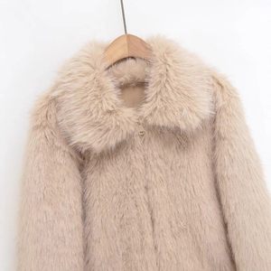 Chic light apricot faux fur jacket featuring a stylish collar and metal zipper detail