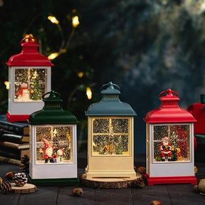 Retro Christmas lantern with LED light and swirling glitter featuring Santa and snowman
