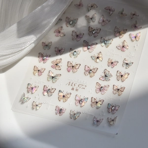 Macro detail of MS572 butterfly nail art stickers with laser crystal rhinestones