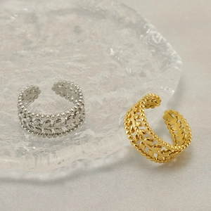 Adjustable hollow leaf pattern titanium steel rings in gold and silver finishes