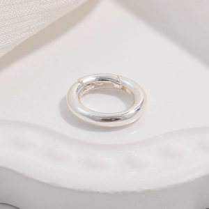 Macro shot of silver S925 sterling silver spring ring clasp for jewelry necklace making