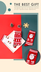 Detail of festive Christmas cotton socks with Santa Claus patterns and holiday motifs