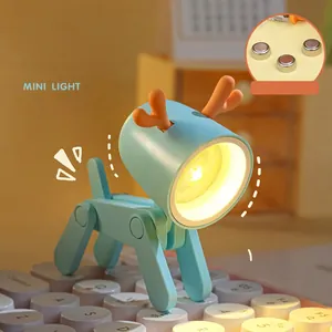 Mini deer LED night light in mint blue with adjustable joints and warm yellow glow