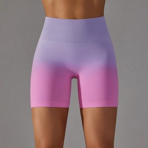 Seamless high-waisted yoga shorts with purple to pink gradient and compression band