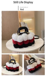 Detail of red and black faux fur handbag featuring leather handles and gold hardware