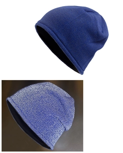 Close-up of dark blue reflective knit beanie showing rib-knit texture and warm lining