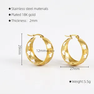 Detail of 18K gold plated stainless steel star hoop earrings showing 29mm outer diameter size