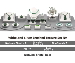 Brushed silver jewelry display set featuring necklace stands, ring holders, and panels