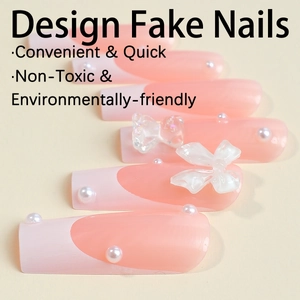 Extra-long French press on nails with 3D bows, pearls, and bear accents in nude pink