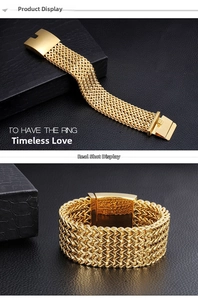 Detailed close-up of wide gold-plated stainless steel woven fish scale chain bracelet
