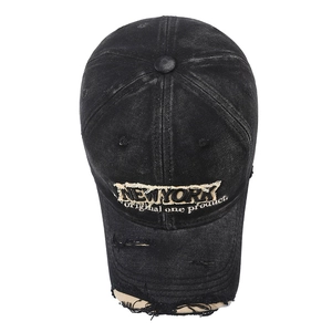Vintage washed black denim baseball cap with New York embroidery and distressed ripped details