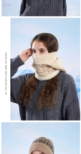 Detailed knit texture and black pattern on warm beige winter beanie and scarf set