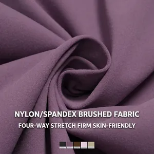 Pantalon de sport large pour femme en tissu brossé extensible de couleur violet foncé
