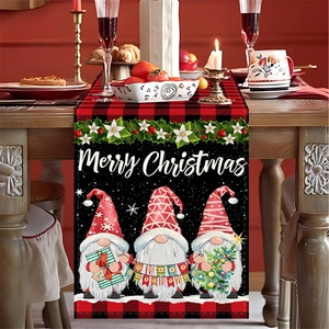Detail of Christmas table runner with gnomes and red black buffalo plaid border
