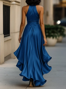 Detail of royal blue satin halter maxi dress showing back draping and elegant movement