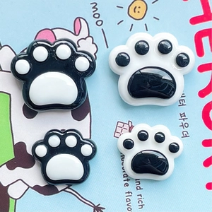 Polished resin cat paw DIY charms in black and white colors for phone case decor