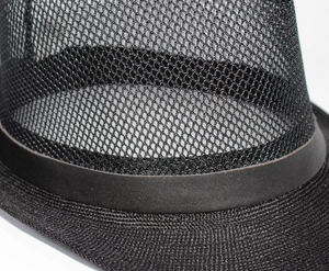 Detailed close-up of breathable black mesh fabric and textured brim on sun hat