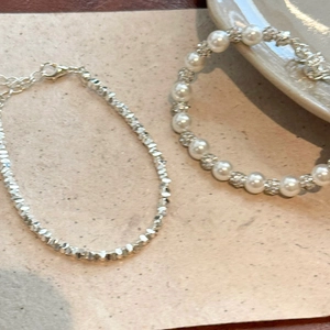 French style silver beaded bracelet set with elegant pearls and faceted metal beads