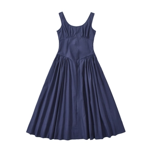 Detail of high-waist pleated design and matte fabric on this navy sleeveless maxi dress
