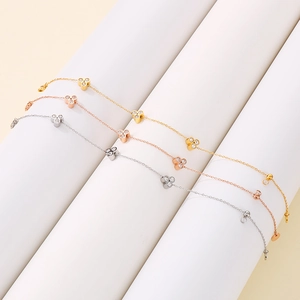 Minimalist stainless steel clover bracelets with diamonds in gold, rose gold, and silver