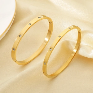 Minimalist gold plated stainless steel bangle with sparkling cubic zirconia inlay