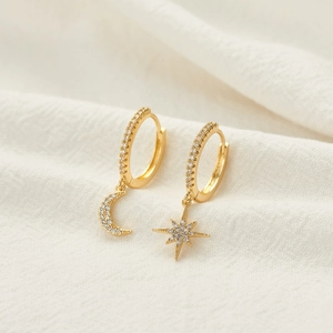 Elegant gold-plated asymmetric moon and star drop earrings with sparkling cubic zirconia