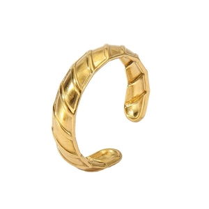 Detail of 18k gold plated open ring featuring vintage spiral relief texture on band