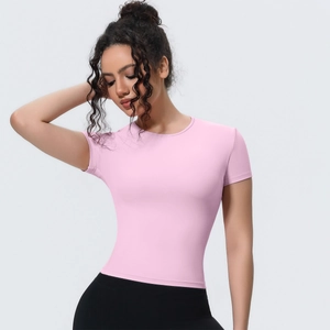 Slim fit pink yoga t-shirt for women with moisture-wicking and breathable fabric detail