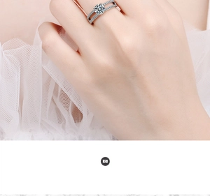 Close-up of double-row zirconia ring with round main stone on model with lace