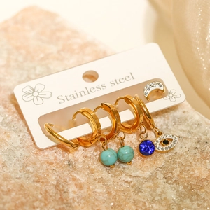 Golden stainless steel earring set featuring evil eye, turquoise beads, and blue gemstone