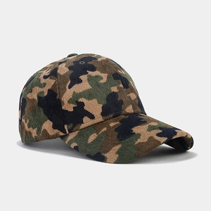 Macro view of jungle camouflage baseball cap featuring premium textured corduroy fabric