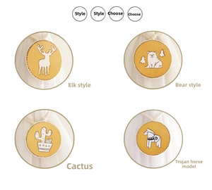 Detail of wooden curtain tiebacks with Nordic elk, bear, cactus, and horse designs